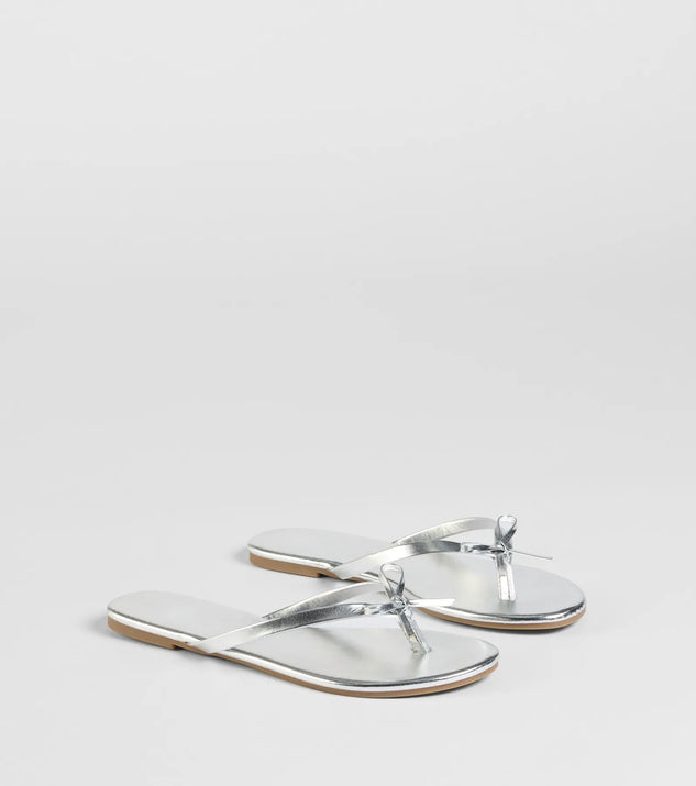 Stay on-trend this season with the Perfect Pair Bow Detail Thong Strap Sandals in silver, a must-have for creating stylish and effortless spring outfits for women.