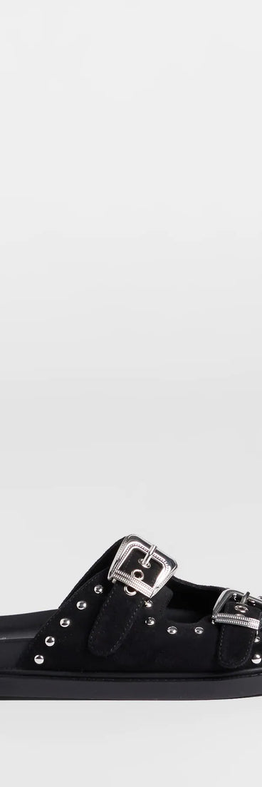 Elevate warm-weather looks with Cool Girl Studded Western Buckle Sandals in black, a pair of trendy sandals bringing chic, modern flair to every step.