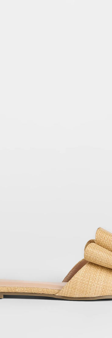 Elevate warm-weather looks with Charming Moves Woven Bow Sandals in natural, a pair of trendy sandals bringing chic, modern flair to every step.