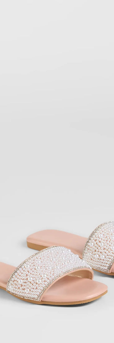 Stay on-trend this season with the Ever So Chic Rhinestone Pearl Sandals in nude, a must-have for creating stylish and effortless summer outfits for women.