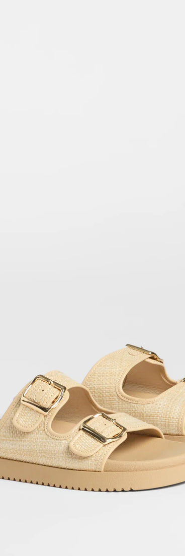 Get inspired with the Under The Sun Straw Buckle Slide Sandals, a feed-worthy beige piece that’s part of Windsor's updated and curated women’s clothing edit packed with must-have fall outfit ideas.