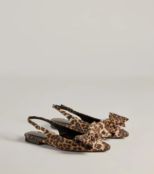 The Spotted Allure Leopard Print Bow Flats are women's leopard print shoes for work, featuring a sleek silhouette and cushioned sole for all-day comfort, and are a trendy choice for professional or business casual outfits.