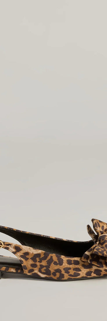 The Spotted Allure Leopard Print Bow Flats are women's leopard print shoes for work, featuring a sleek silhouette and cushioned sole for all-day comfort, and are a trendy choice for professional or business casual outfits.