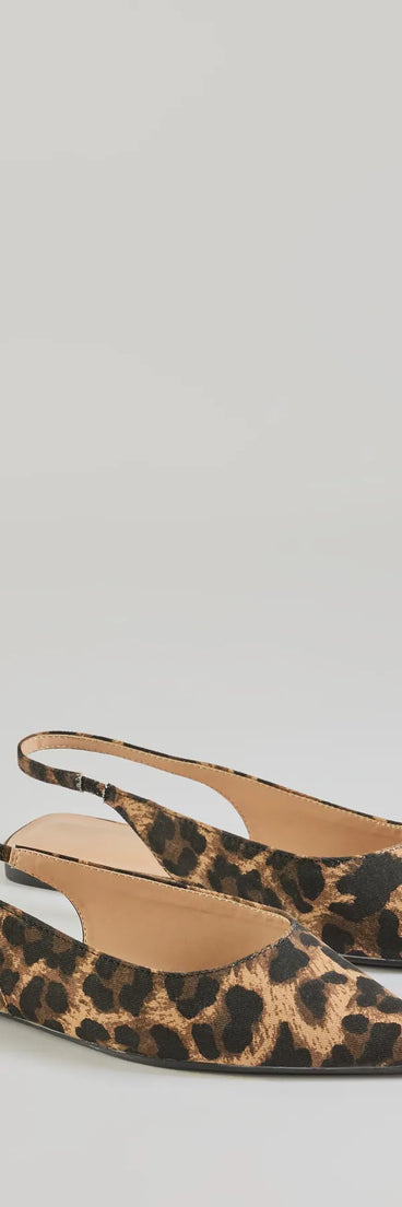 The Untamed Chic Leopard Print Pointy Flats are women's leopard print shoes for work, featuring a sleek silhouette and cushioned sole for all-day comfort, and are a trendy choice for professional or business casual outfits.