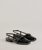 The The Classic Faux Patent Leather Mary Jane Flats are women's black shoes for work, featuring a sleek silhouette and cushioned sole for all-day comfort, and are a trendy choice for professional or business casual outfits.