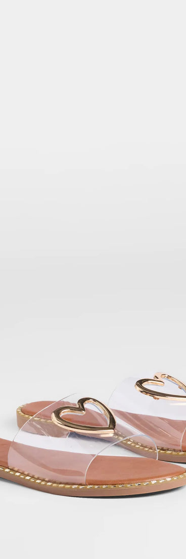 Stay on-trend this season with the Totally Heart Flat Sandals in clear, a must-have for creating stylish and effortless fall outfits for women.