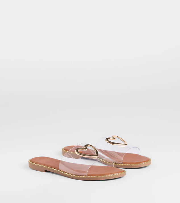 Stay on-trend this season with the Totally Heart Flat Sandals in clear, a must-have for creating stylish and effortless spring outfits for women.
