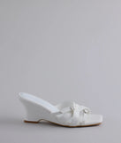 Turn heads in the Playing It Cute Strappy Buckle Wedge Heels, white heels showcasing a fresh trend or stylish detail made to elevate your full Windsor fit.