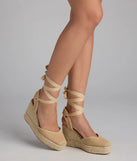 Elevate warm-weather looks with Weekend Getaway Lace-Up Espadrille Wedges in tan, a pair of trendy sandals bringing chic, modern flair to every step.