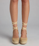 Elevate warm-weather looks with Weekend Getaway Lace-Up Espadrille Wedges in tan, a pair of trendy sandals bringing chic, modern flair to every step.