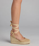 Elevate warm-weather looks with Weekend Getaway Lace-Up Espadrille Wedges in tan, a pair of trendy sandals bringing chic, modern flair to every step.