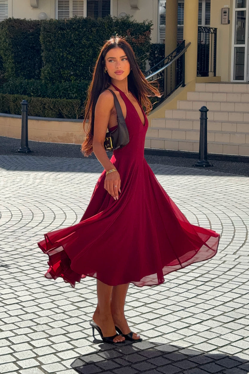 Shop midi dresses designed with flattering fits, graceful movement, and chic style that goes from day to night.