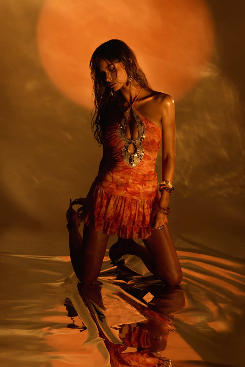 Moonlight Muse—shop club dresses featuring bold prints, playful ruffles, beaded details, and unforgettable nights out.