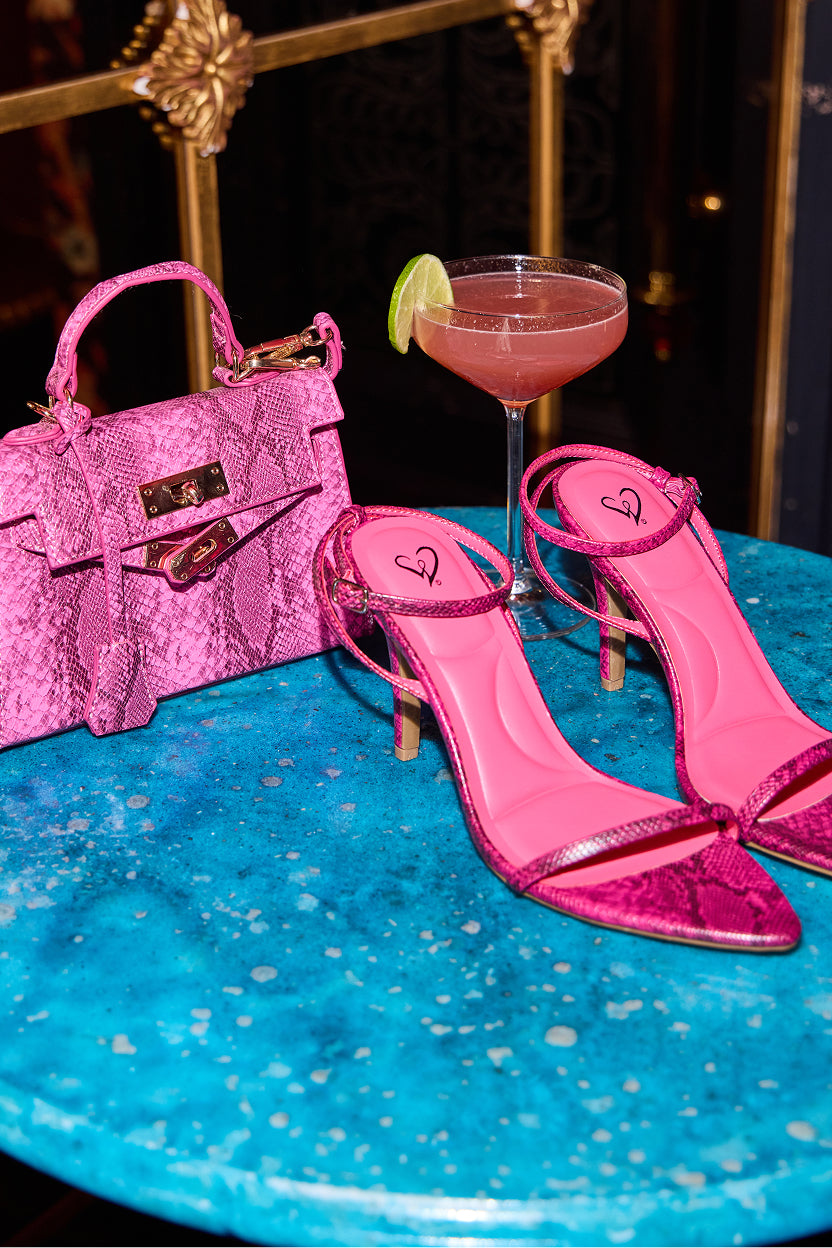 Shop heels that make a high-impact statement with bold color, sleek straps, and sky-high stilettos.