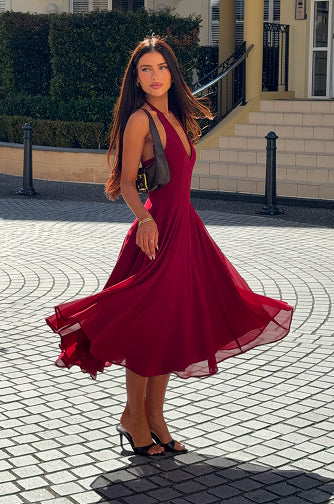 Shop midi dresses designed with flattering fits, graceful movement, and chic style that goes from day to night.