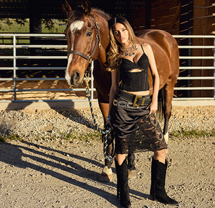 Shop sale bottoms featuring lace skirts, sleek satin finishes, and statement details like bold belts and western-inspired edge—all at can’t-miss prices.