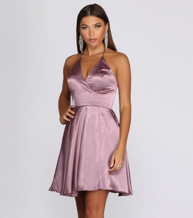Sandy Halter Formal Dress creates the perfect spring wedding guest dress or cocktail attire with stylish details in the latest trends for 2023!
