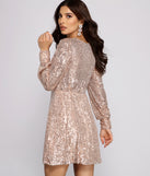 Sadie Formal Long Sleeve Sequin Mini Dress creates the perfect spring wedding guest dress or cocktail attire with stylish details in the latest trends for 2023!