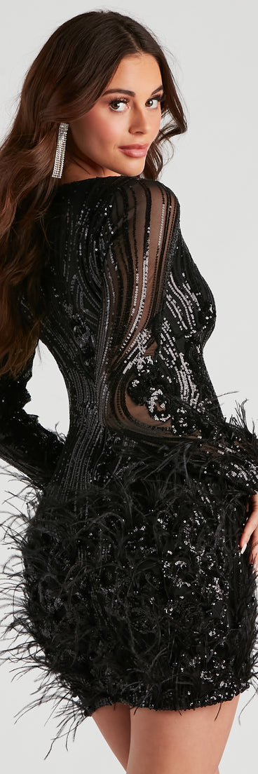 You’ll look fabulous in the Desirae Black Sequin Short Prom Dress with a feather hem and wispy feathers on the long sheer sleeves.