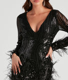 The V-neckline on the Desirae Black Sequin Short Prom Dress in a bodycon silhouette.