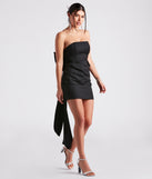 The Madilyn Strapless Bow Mini Dress is a unique party dress to help you create a look for work parties, birthdays, anniversaries, or your next 2023 celebration!