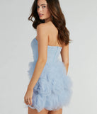 You'll be the best dressed in the Toni Strapless Corset Rosette Mesh Party Dress as your summer formal dress with unique details from Windsor.