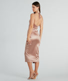 You'll be the best dressed in the Amanda Wrap Satin Dress as your summer formal dress with unique details from Windsor.