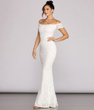 The Adley Lace Gown is a gorgeous pick as your 2023 prom dress or formal gown for wedding guest, spring bridesmaid, or army ball attire!
