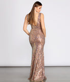Ruby Formal Sleeveless Sequin Dress creates the perfect summer wedding guest dress or cocktail party dresss with stylish details in the latest trends for 2023!