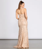 The Camille Glitter And Mesh Cross Back Dress is a gorgeous pick as your 2023 prom dress or formal gown for wedding guest, spring bridesmaid, or army ball attire!