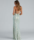 You'll be the best dressed in the Edlyn Sequin Laceup Mermaid Formal Dress as your summer formal dress with unique details from Windsor.