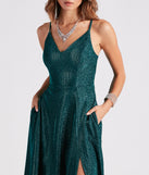 You'll be the best dressed in the Mckenna Formal Glitter A-Line Dress as your summer formal dress with unique details from Windsor.