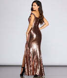 The Anika Off The Shoulder Sequin Dress is a gorgeous pick as your 2023 prom dress or formal gown for wedding guest, spring bridesmaid, or army ball attire!