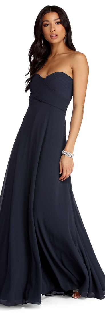 The Audrey Pleated Sweetheart Dress is a gorgeous pick as your 2023 prom dress or formal gown for wedding guest, spring bridesmaid, or army ball attire!