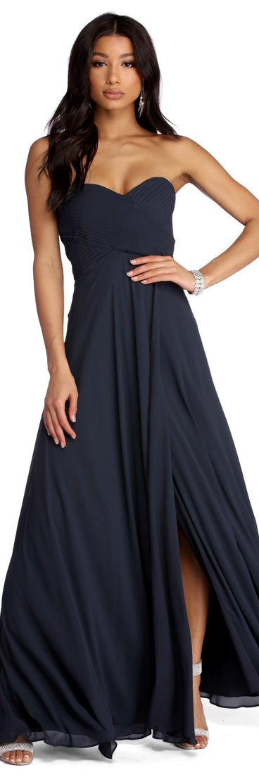 The Audrey Pleated Sweetheart Dress is a gorgeous pick as your 2023 prom dress or formal gown for wedding guest, spring bridesmaid, or army ball attire!