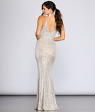 Teagan Sequin Gown creates the perfect spring wedding guest dress or cocktail attire with stylish details in the latest trends for 2023!