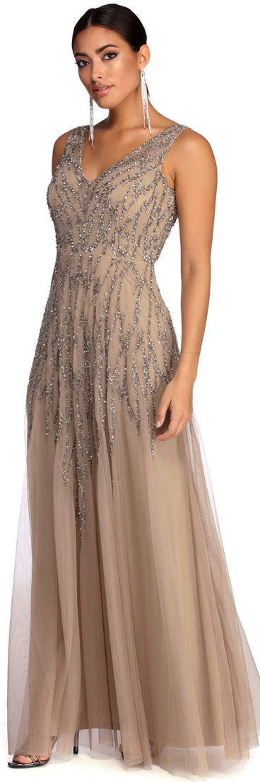 The Gia Formal Sleeveless Beaded Dress is a gorgeous pick as your 2023 prom dress or formal gown for wedding guest, spring bridesmaid, or army ball attire!