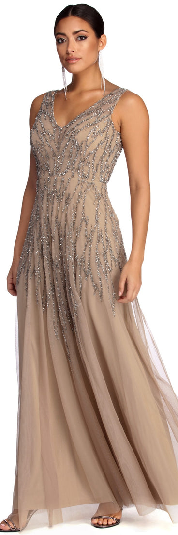 The Gia Formal Sleeveless Beaded Dress is a gorgeous pick as your 2023 prom dress or formal gown for wedding guest, spring bridesmaid, or army ball attire!