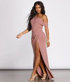You'll be the best dressed in the Kaleigh Off Shoulder Dress as your summer formal dress with unique details from Windsor.
