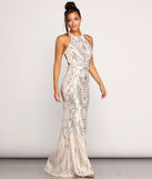 Payton Formal Sleeveless Sequin Dress is a stunning choice for a bridesmaid dress or maid of honor dress, and to feel beautiful at Prom 2023, spring weddings, formals, & military balls!