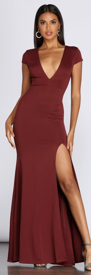 Raven Cap Sleeve Evening Gown creates the perfect spring wedding guest dress or cocktail attire with stylish details in the latest trends for 2023!