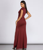 Raven Cap Sleeve Evening Gown creates the perfect spring wedding guest dress or cocktail attire with stylish details in the latest trends for 2023!