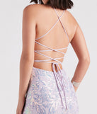 You'll be the best dressed in the Edlyn Sequin Laceup Mermaid Formal Dress as your summer formal dress with unique details from Windsor.
