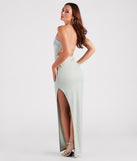 You'll be the best dressed in the Mckayla Formal Glitter Strappy Back Dress as your summer formal dress with unique details from Windsor.
