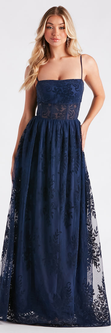 Carmelle Formal Flocked Mesh A-Line Dress is the perfect prom dress pick with on-trend details to make the 2024 dance your most memorable event yet!