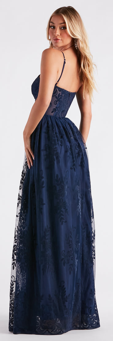 Carmelle Formal Flocked Mesh A-Line Dress is the perfect prom dress pick with on-trend details to make the 2024 dance your most memorable event yet!