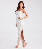 You'll be the best dressed in the Carmela Formal High Slit Glitter Dress as your summer formal dress with unique details from Windsor.