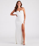 You'll be the best dressed in the Larisa Formal Chiffon Strapless Crepe Dress as your summer formal dress with unique details from Windsor.