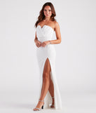You'll be the best dressed in the Larisa Formal Chiffon Strapless Crepe Dress as your summer formal dress with unique details from Windsor.