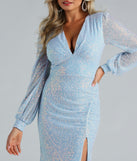 You'll be the best dressed in the Mona Formal Sequin Long Sleeve Mermaid Dress as your summer formal dress with unique details from Windsor.